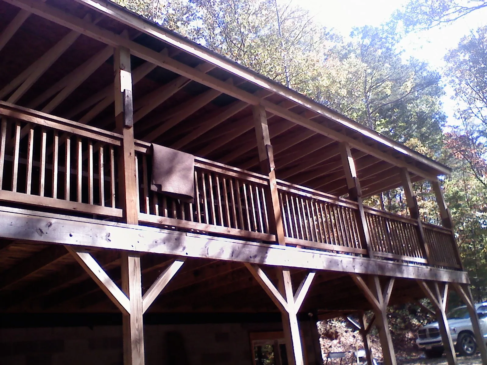 Timber framing under a new elevated porch and deck — Roof Leak Repair in Bowersville by Roofing Brothers